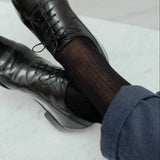 Chaussettes noires en 100% fil d'écosse de la marque Mazarin. Modèle mi-mollet (court) pour homme fin et léger, à porter en toute saison. Pointures : du 39 au 45.