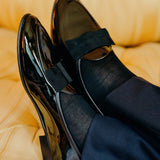 Chaussettes lisses noires en 100% soie. Modèle mi-bas (hautes) pour homme, de la marque Gamarelli. Très fines, douces, et thermorégulatrices. Pointures : du 36 au 49