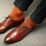 Chaussettes de contention couleurs orange et bleu roi, en 45% Coton, 46% Polyamide, 9% Élasthanne. Modèle de mi-bas (hautes) pour homme, de la marque Mazarin. Épaisses, élégantes, confortables. Pointures : du 37 au 46