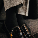 Chaussettes noires en 72% Fil d'Ecosse, 26% Polyamide, 2% Elasthanne. Modèle de mi-mollet (courtes) pour femme de la marque Daphné. Légères, fines et douces. Pointure : du 36 au 41