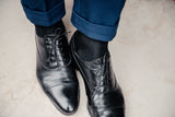 Chaussettes noires Mazarin en coton extra-doux lisse sans côtes. Chaussettes pour homme et femme, disponibles du 36 au 47. Fabriquées en Italie. 